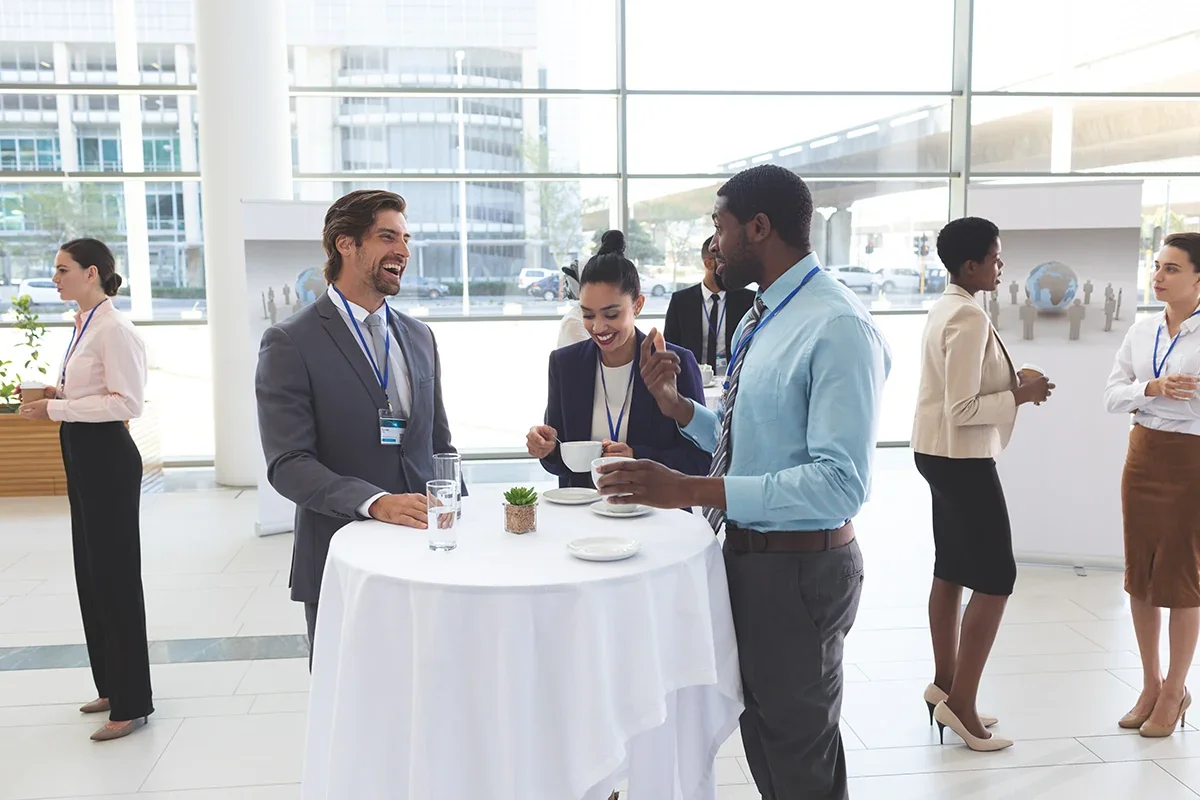 Business professionals networking at a conference